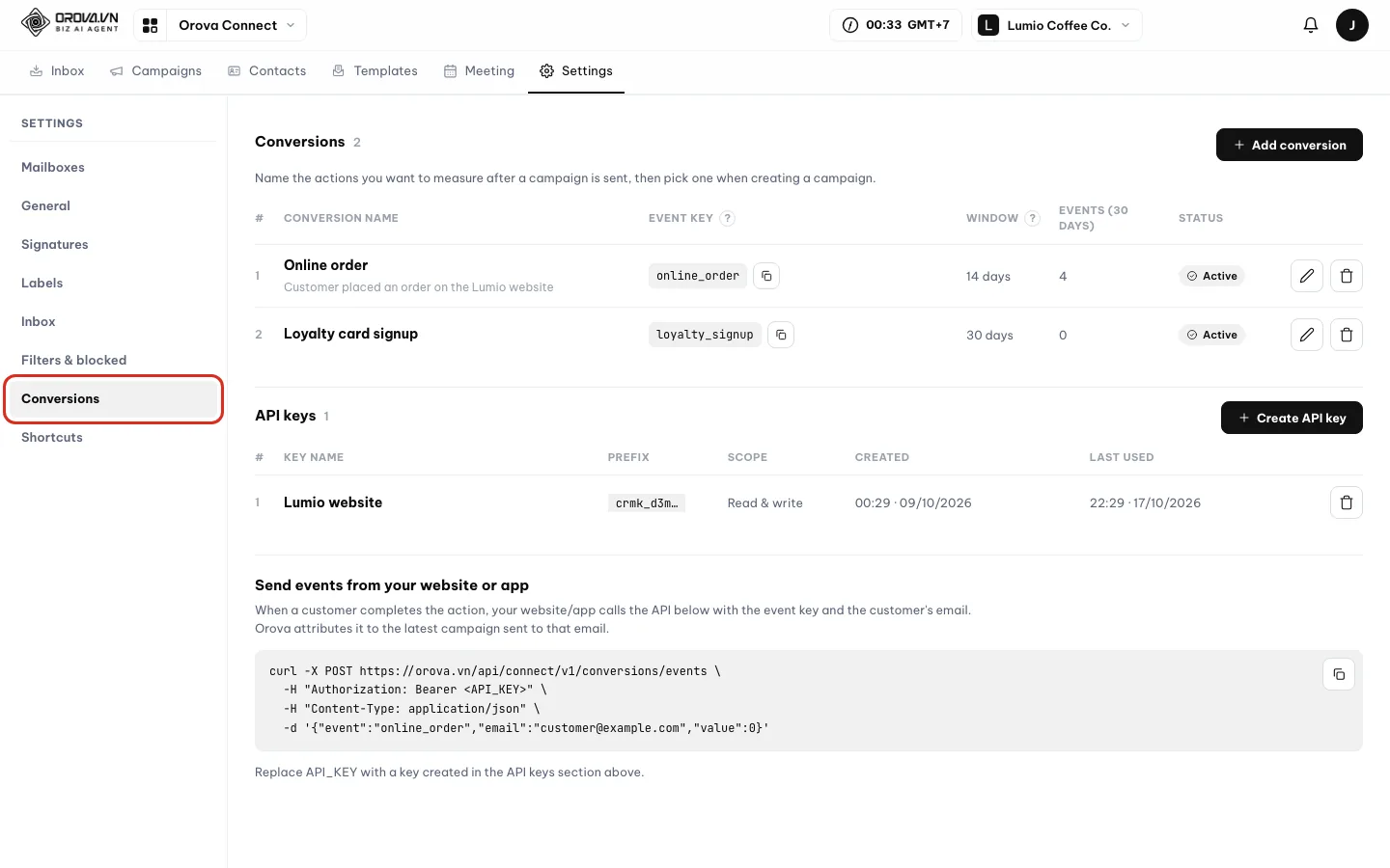 Connect Settings with Conversions in the left menu outlined in red; a table of two conversions, the API keys block and the sample command